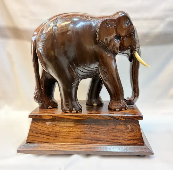 Solid_Rosewood_Elephant_Statue_with_Wooden_Base_–_Handcrafted_Indian_Hardwood_Animal_Sculpture_for_Living_Room_&_Office_Decor