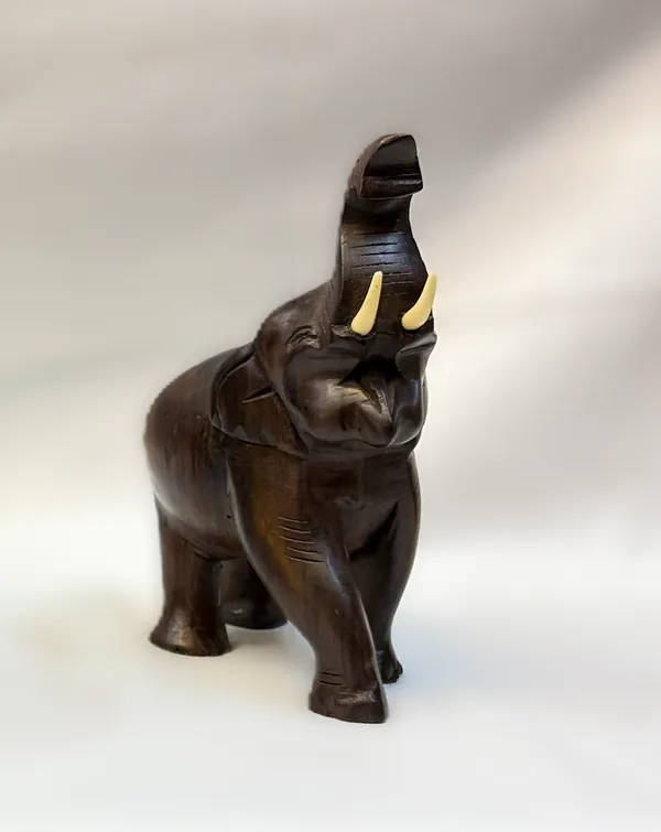 Hand-Carved_Solid_Rosewood_Elephant_with_Raised_Trunk_–_Authentic_Indian_Hardwood_Sculpture_for_Good_Luck_&_Prosperity