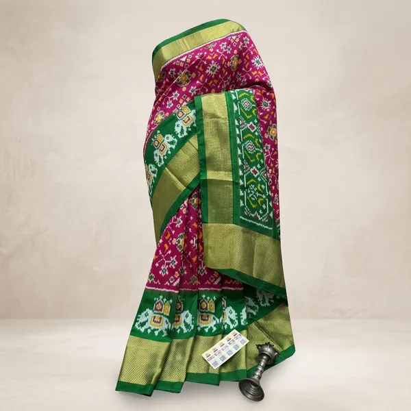 Pinkish_Magenta_Patola_Print_Ikat_Silk_Saree_With_Green_Border