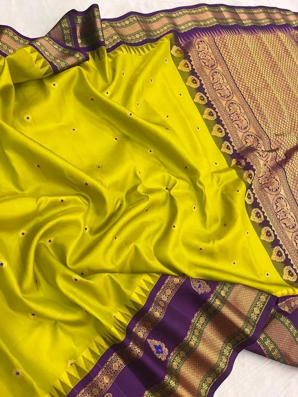 Yellow_Exclusive_Banarasi_Silk_Saree_With_Unique_Temple_Borders