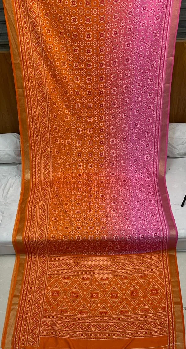 Premium_Orange_Bandhej_Designer_Saree_with_Elegant_Traditional_Prints