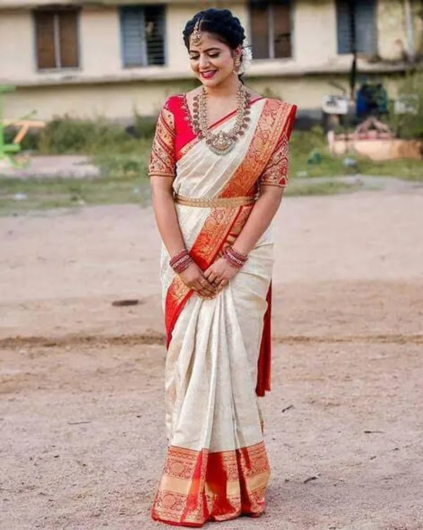 White_Colour_Rich_Pallu_Banarasi_Lichi_Silk_Saree_with_Golden_Zari_Work