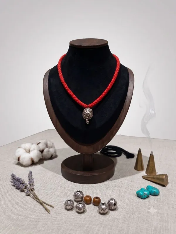 Oxidised_Metal_Ball_Pendant_In_Red_Thread