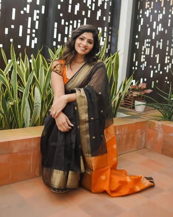 Designer_Black_Orange_Saree_with_Golden_Woven_Motifs_&_Rich_Border