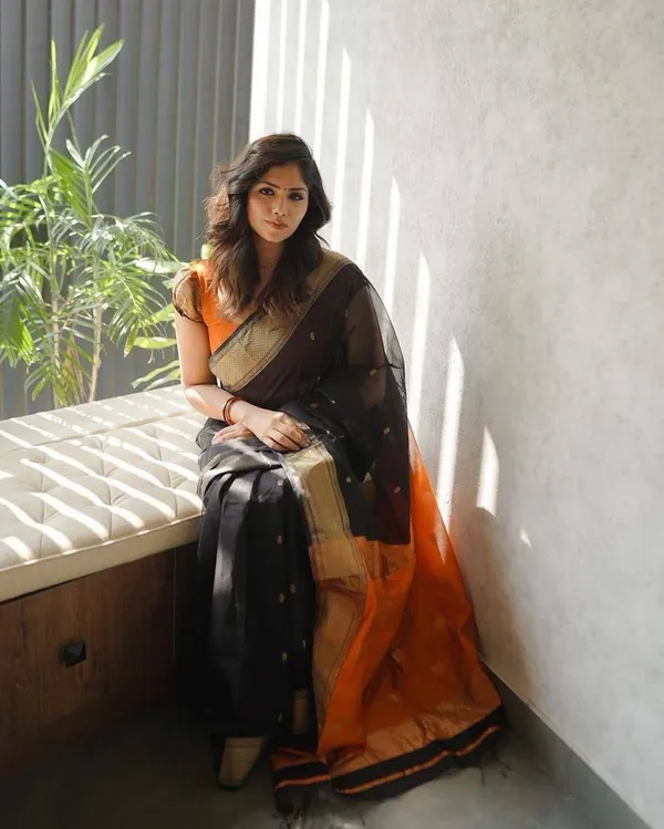 Designer_Black_Orange_Saree_with_Golden_Woven_Motifs_&_Rich_Border