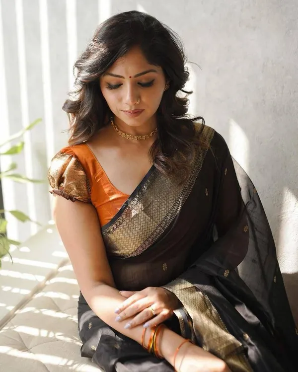 Designer_Black_Orange_Saree_with_Golden_Woven_Motifs_&_Rich_Border
