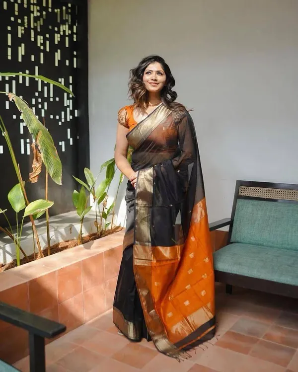 Designer_Black_Orange_Saree_with_Golden_Woven_Motifs_&_Rich_Border