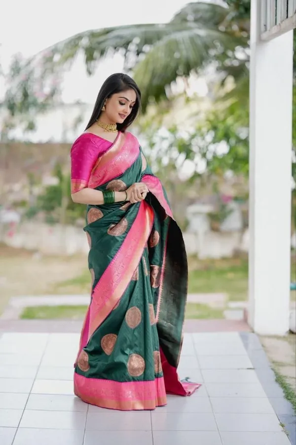 Elegant_Bottle_Green_Saree_with_Pink_Golden_Border_&_Rich_Circular_Woven_Motifs