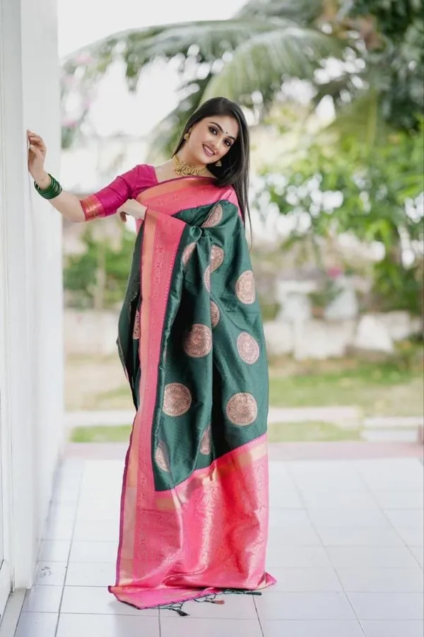 Elegant_Bottle_Green_Saree_with_Pink_Golden_Border_&_Rich_Circular_Woven_Motifs