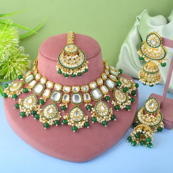Elegant_Green_Kundan_Necklace_Set_With_Maang_Tikka_&_Jhumka_Earrings