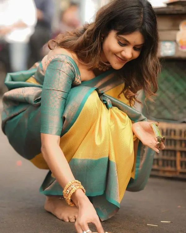 Elegant_Mustard_Yellow_Soft_Lichi_Silk_Saree_with_Teal_Woven_Border