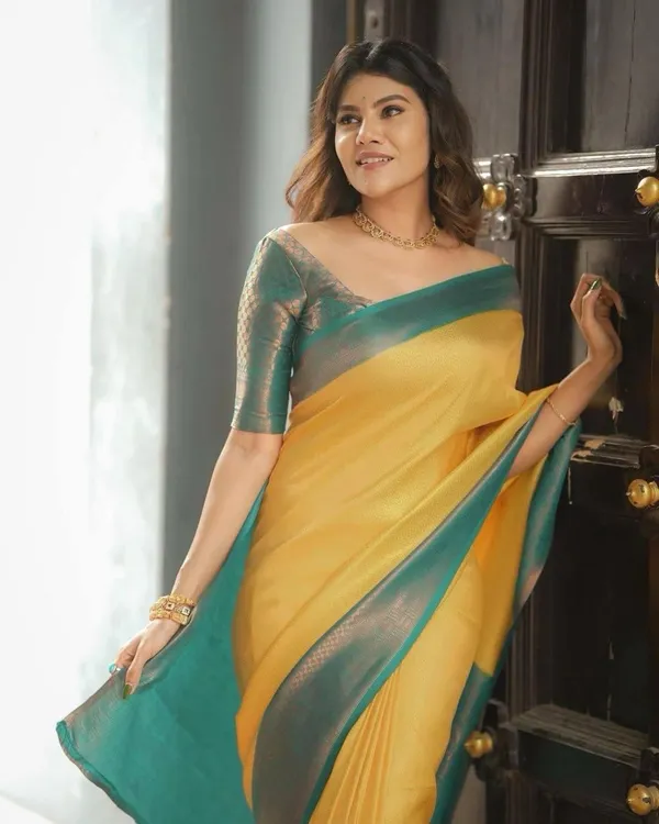 Elegant_Mustard_Yellow_Soft_Lichi_Silk_Saree_with_Teal_Woven_Border