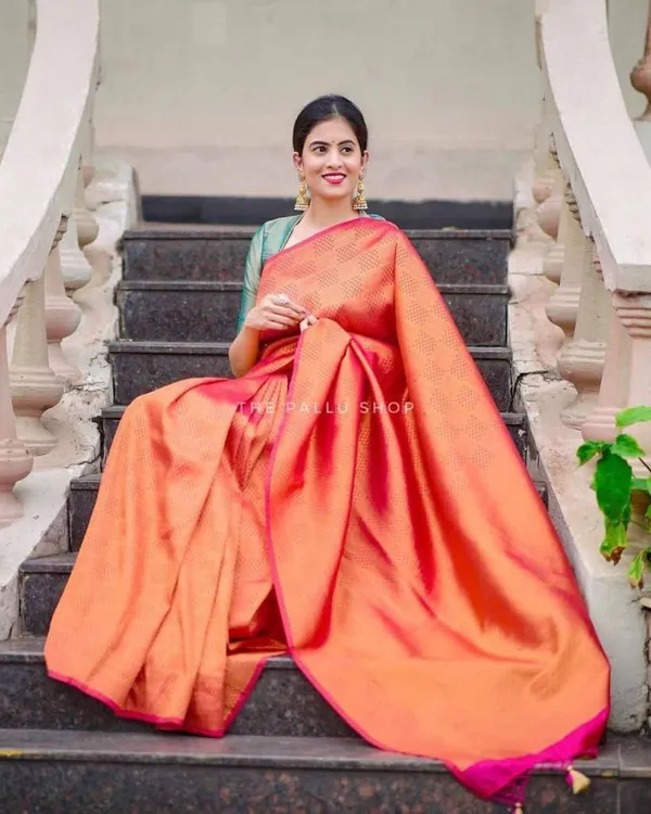 Elegant_Peach_Pink_Silk_Saree_with_Woven_Checks_&_Contrast_Teal_Blouse