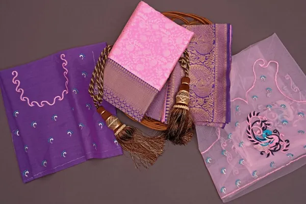 Elegant_Pink_Lichi_Silk_Saree_with_Rich_Purple_Jacquard