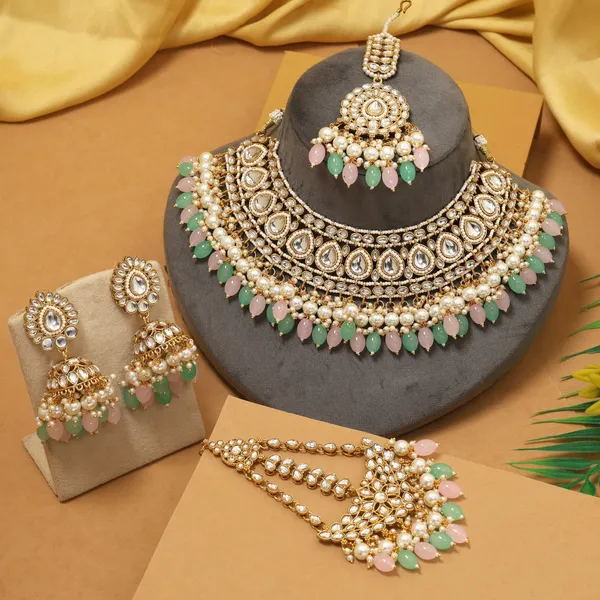 Elegant_Pink_&_Pista_Green_Kundan_Bridal_Necklace_Set_With_Pearl_Detailing_&_Matching_Maang_Tikka