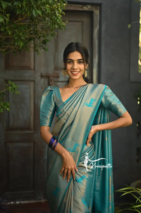 Elegant_Teal_Blue_Soft_Lichi_Silk_Saree_with_All-Over_Jacquard_Weave