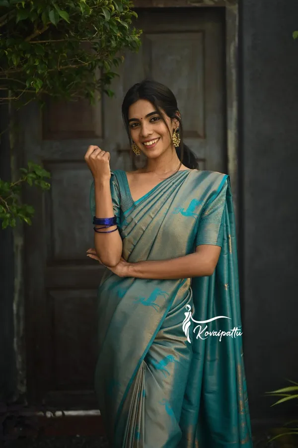 Elegant_Teal_Blue_Soft_Lichi_Silk_Saree_with_All-Over_Jacquard_Weave