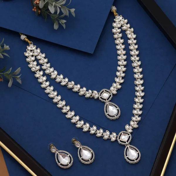 Elegant_White_Kundan_Necklace_Set_with_Leaf_Motif_&_Stone_Studded_Earrings_–_Wedding_&_Festive_Jewellery