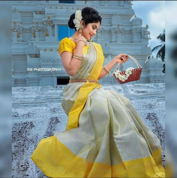 Elegant_White_&_Yellow_Soft_Lichi_Silk_Saree_with_Rich_Jacquard_Pallu_and_Border