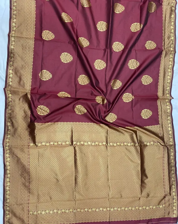 Maroon_Soft_Lichi_Silk_Saree_with_Rich_Golden_Jacquard_Motifs