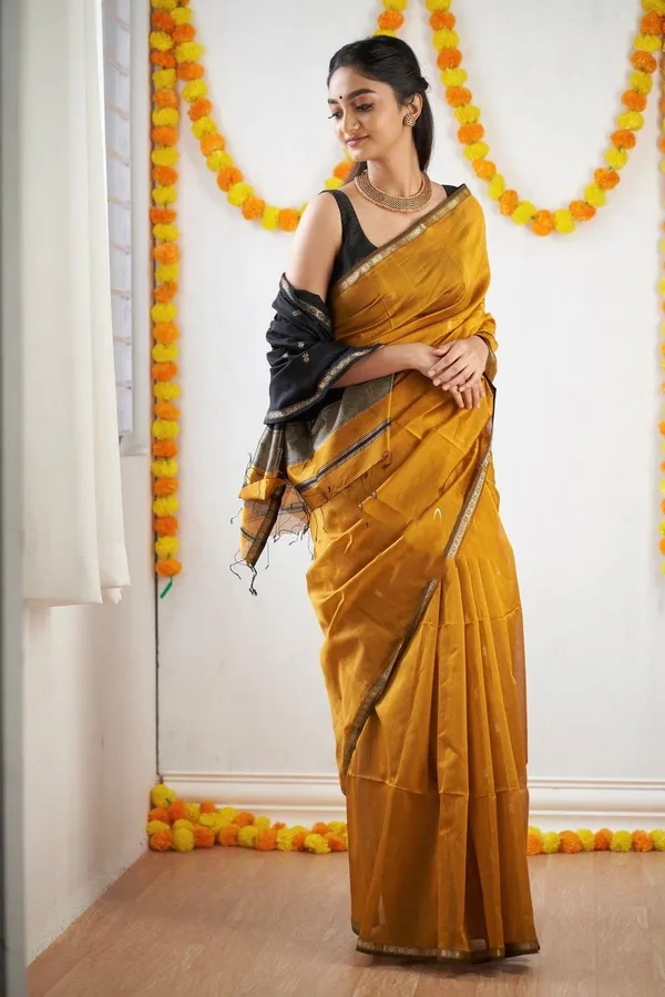 Mustard_Gold_Soft_Lichi_Silk_Saree_with_Rich_Jacquard_Pallu_&_Black_Zari_Border