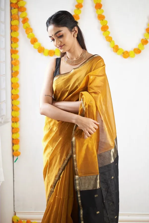 Mustard_Gold_Soft_Lichi_Silk_Saree_with_Rich_Jacquard_Pallu_&_Black_Zari_Border