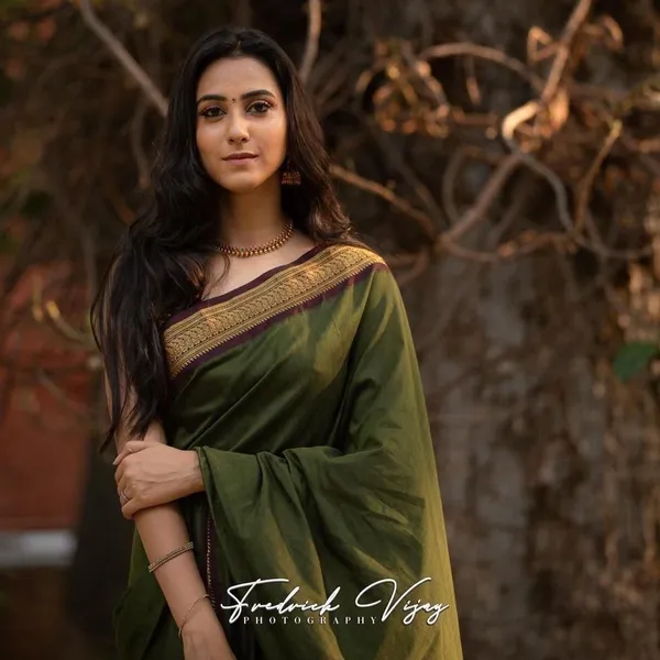 Olive_Green_Soft_Lichi_Silk_Saree_with_Black_Rich_Pallu_&_Jacquard_Work