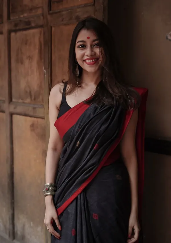 Premium_Black_Lilan_Slab_Saree_with_Rich_Woven_Pallu_&_Red_Border