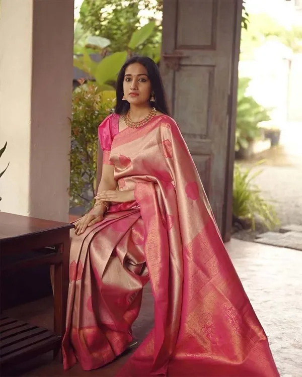 Premium_Soft_Lichi_Silk_Saree_with_All-Over_Jacquard_Work_&_Rich_Designer_Pallu_–__Peach