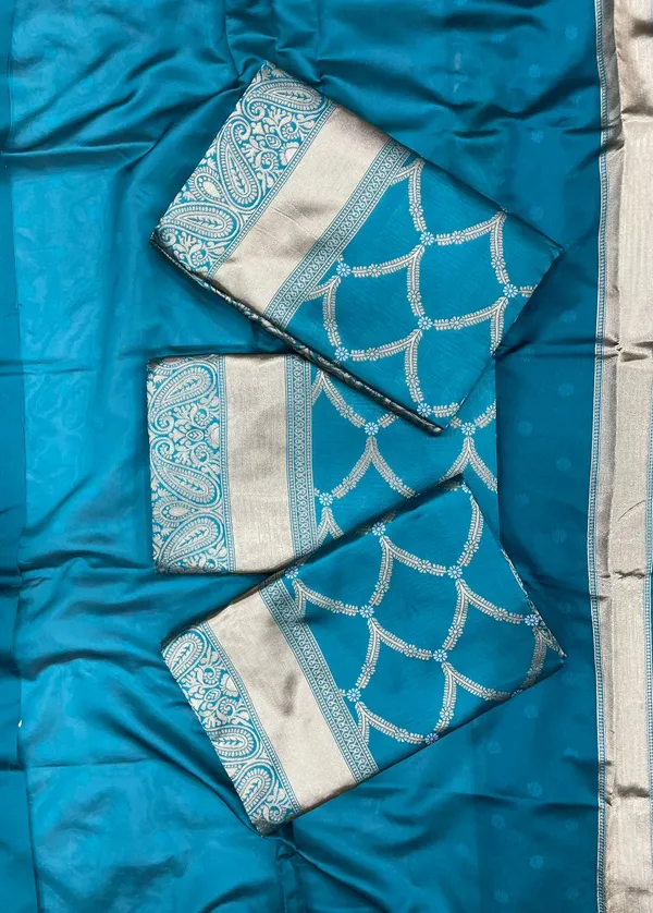 Premium_Soft_Lichi_Silk_Saree_with_Silver_Zari_Jacquard_Weaving_&_Rich_Pallu_–_Teal_Blue