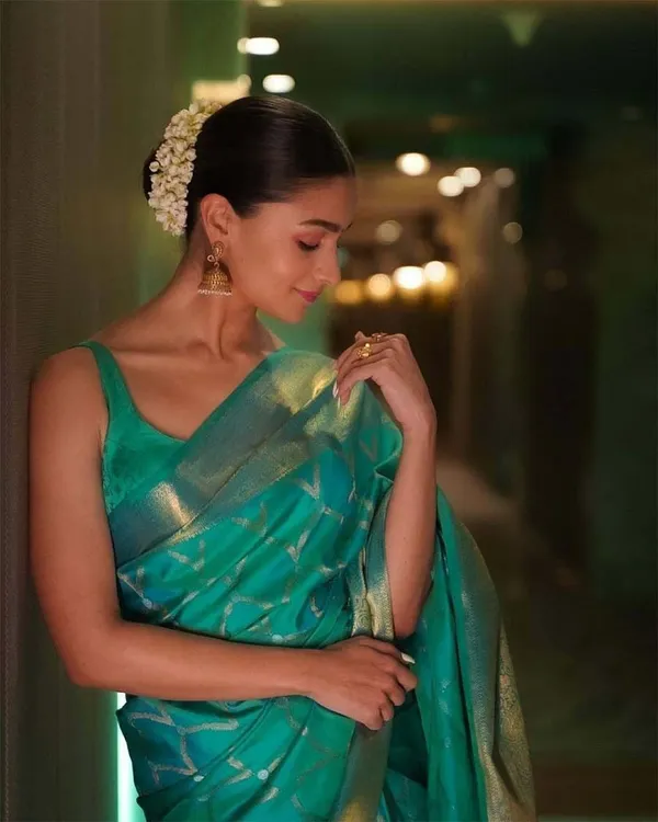Premium_Soft_Lichi_Silk_Saree_with_Silver_Zari_Jacquard_Weaving_&_Rich_Pallu_–_Teal_Blue