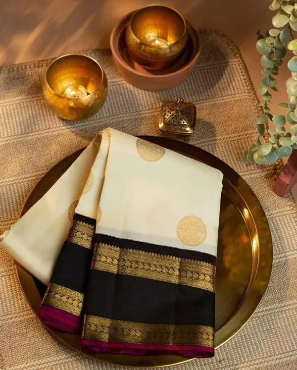 Premium_Soft_Lichi_Silk_White_&_Black_Saree_with_Golden_Jacquard_Zari_Work_&_Rich_Designer_Pallu