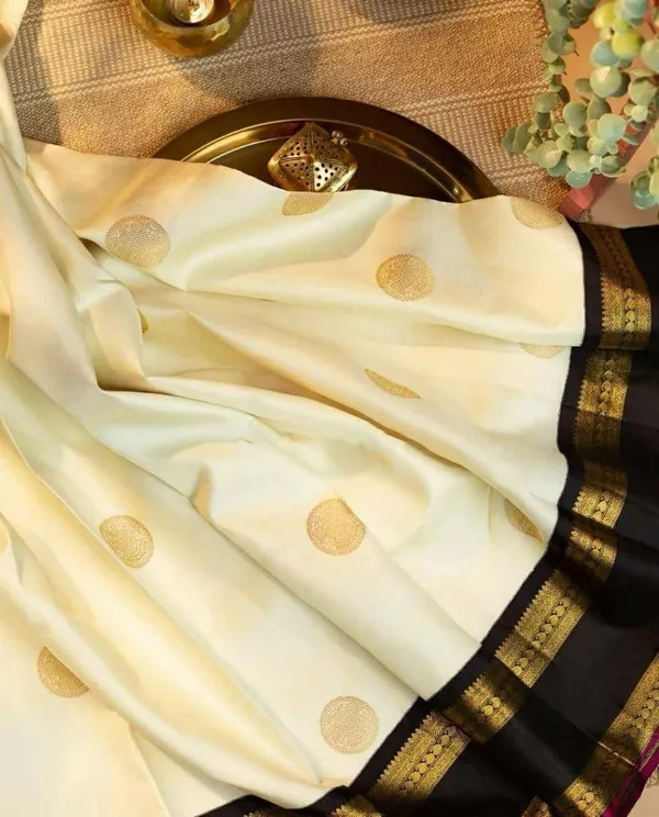 Premium_Soft_Lichi_Silk_White_&_Black_Saree_with_Golden_Jacquard_Zari_Work_&_Rich_Designer_Pallu