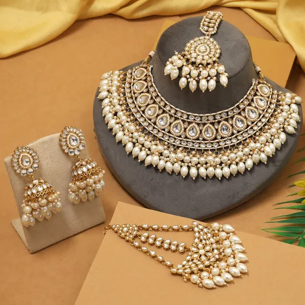 Royal_White_Kundan_Bridal_Necklace_Set_with_Pearl_Detailing,_Jhumka_Earrings,_Maang_Tikka_&_Maang_Pasa
