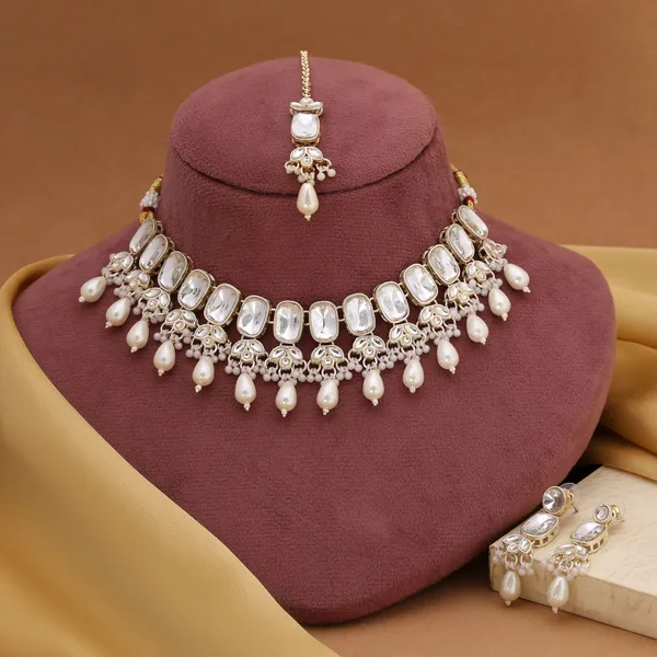 Royal_White_Kundan_Necklace_Set_with_Pearl_Detailing_&_Maang_Tikka_–_Bridal_&_Festive_Jewellery