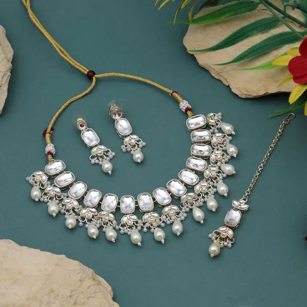 Royal_White_Kundan_Necklace_Set_with_Pearl_Detailing_&_Maang_Tikka_–_Bridal_&_Festive_Jewellery