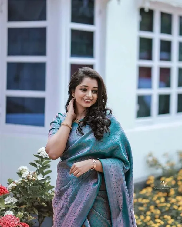 Teal_Blue_Soft_Lichi_Silk_Jacquard_Saree_with_Rich_Woven_Pallu_&_Designer_Border