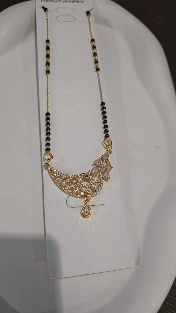 Aakrati_Jewels_Peacock_Charm_Black_Beads_Mangalsutra_Necklace_(Gold_Plated_|_Stainless_Steel_|_Anti-Tarnish)