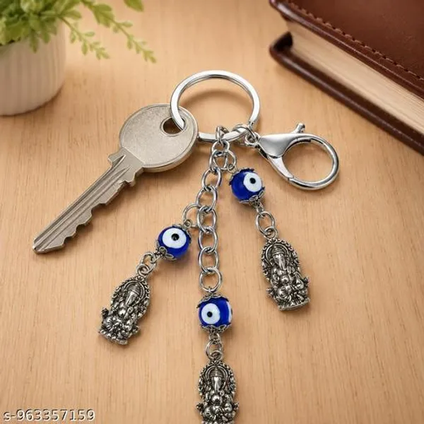 Blue_Metal_Crystal_Stone_Evil_Eye_Butterfly_Keychain_Bag_Charm_And_Blue_Silver_Metal_Evil_Eye_Ganesha_Keychain_For_Men_Women_|_Pack_Of_2