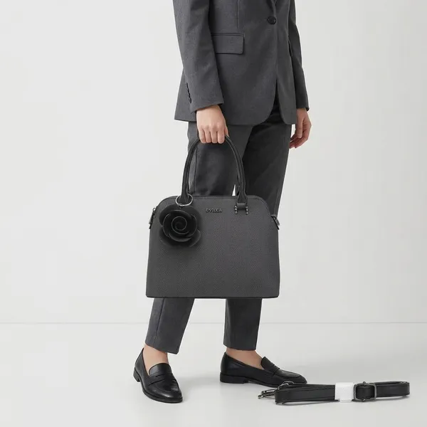 Black_Textured_Dome_Handbag_with_Floral_Charm_and_Strap