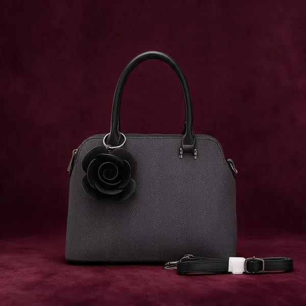 Black_Textured_Dome_Handbag_with_Floral_Charm_and_Strap