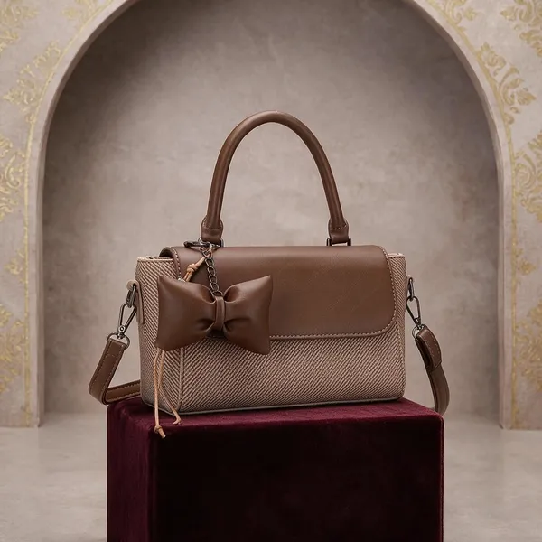 Brown_Textured_Structured_Handbag_With_Bow_Charm_for_Women
