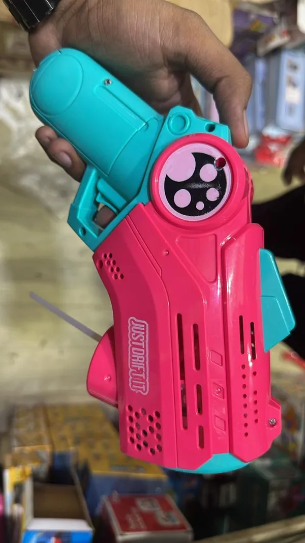 Pink_And_Turquoise_Bubble_Gun_With_Light_And_Sound_Effects