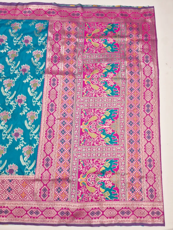 Teal_Woven_Floral_Saree_With_Elephant_Pallu_for_Women