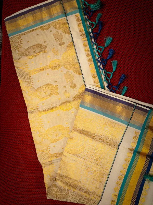 Kerala_Golden_Kasavu_Saree_For_Women_With_Baby_Krishna_Print