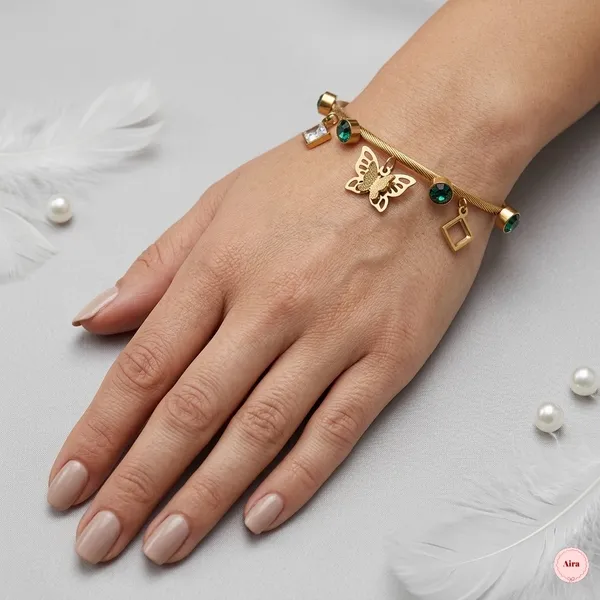 Gold_Tone_Butterfly_Charm_Bracelet_With_Green_Stones