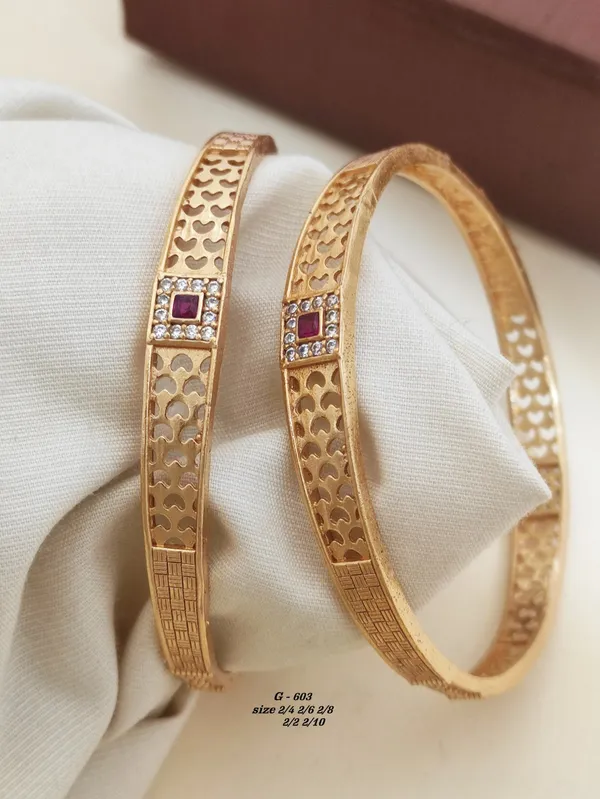 Heart_Pattern_Bangles_With_Ruby_And_Diamond_Accents