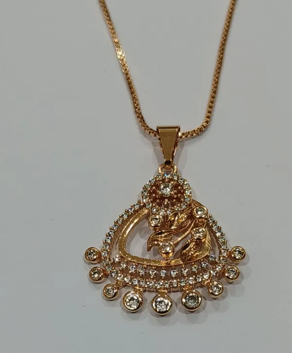 Gold_Tone_Crystal_Studded_Peacock_Pendant_Necklace_With_Matching_Earrings