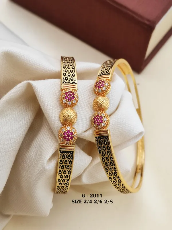 Filigree_Design_Bangles_With_Ruby_And_Zircon_Stones