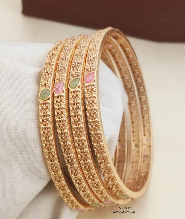 Textured_Bangles_Set_With_Gemstone_Accents_For_Women